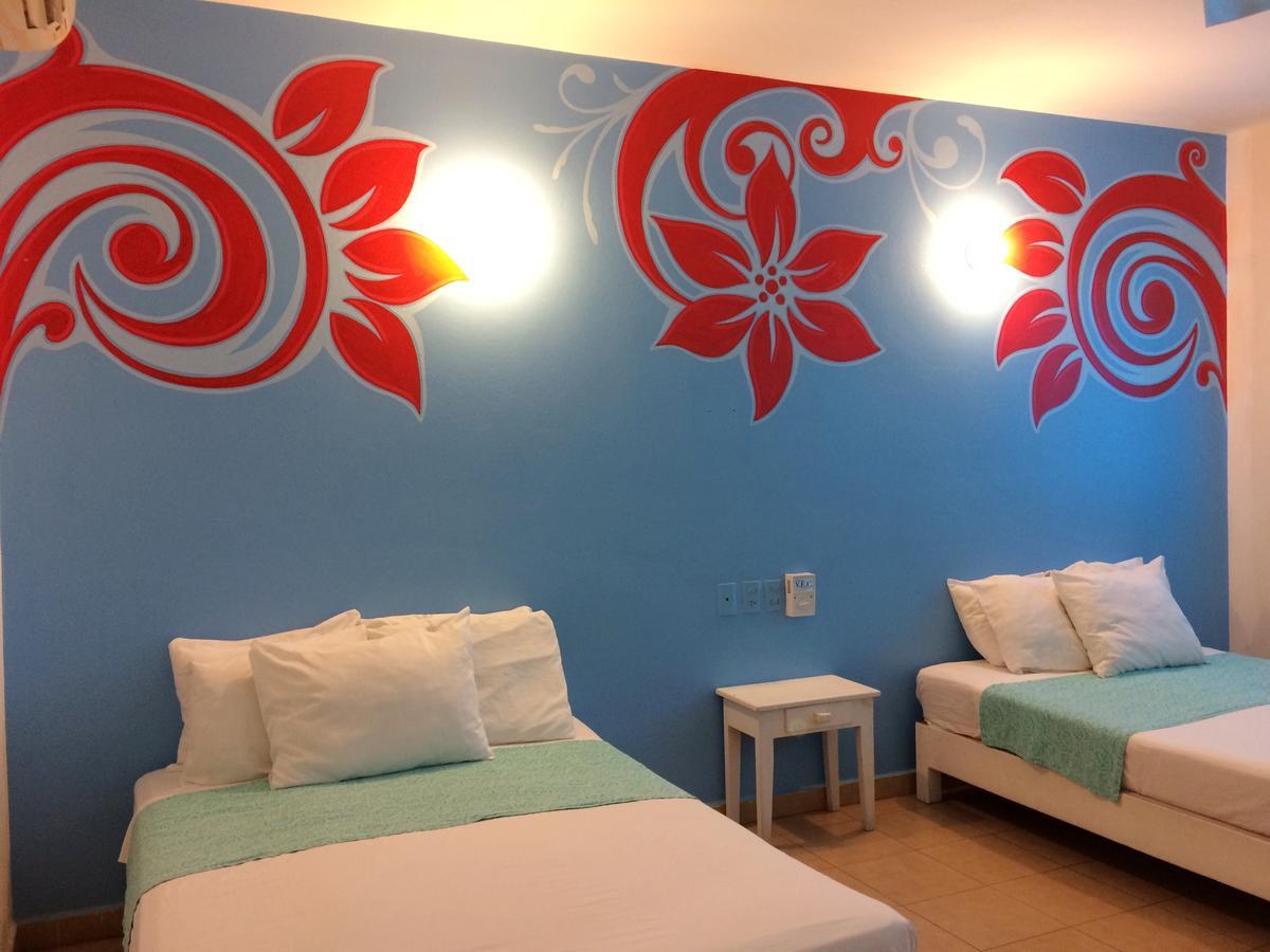 Hotel Playa Del Sol By Rotamundos Huatulco Exterior photo