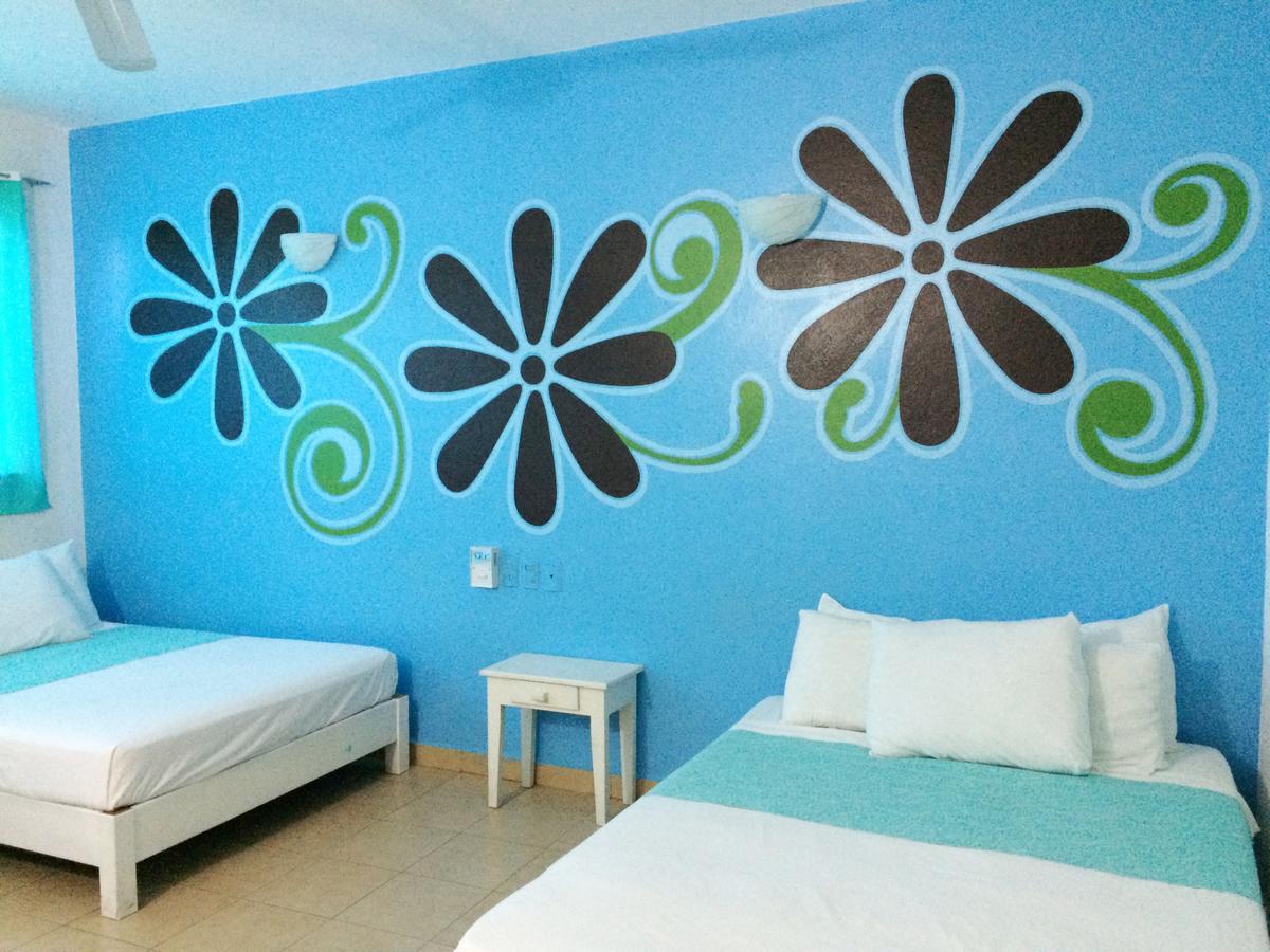 Hotel Playa Del Sol By Rotamundos Huatulco Exterior photo