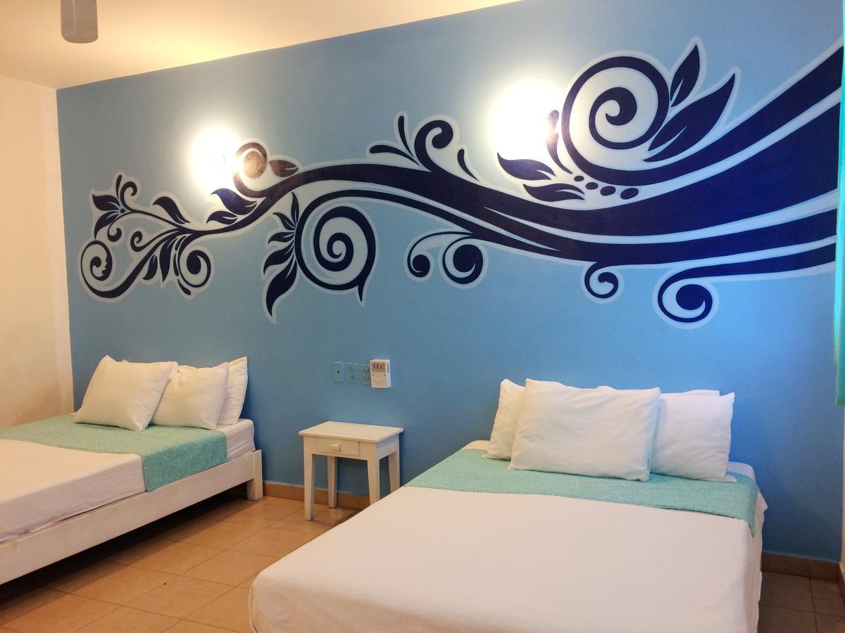 Hotel Playa Del Sol By Rotamundos Huatulco Exterior photo